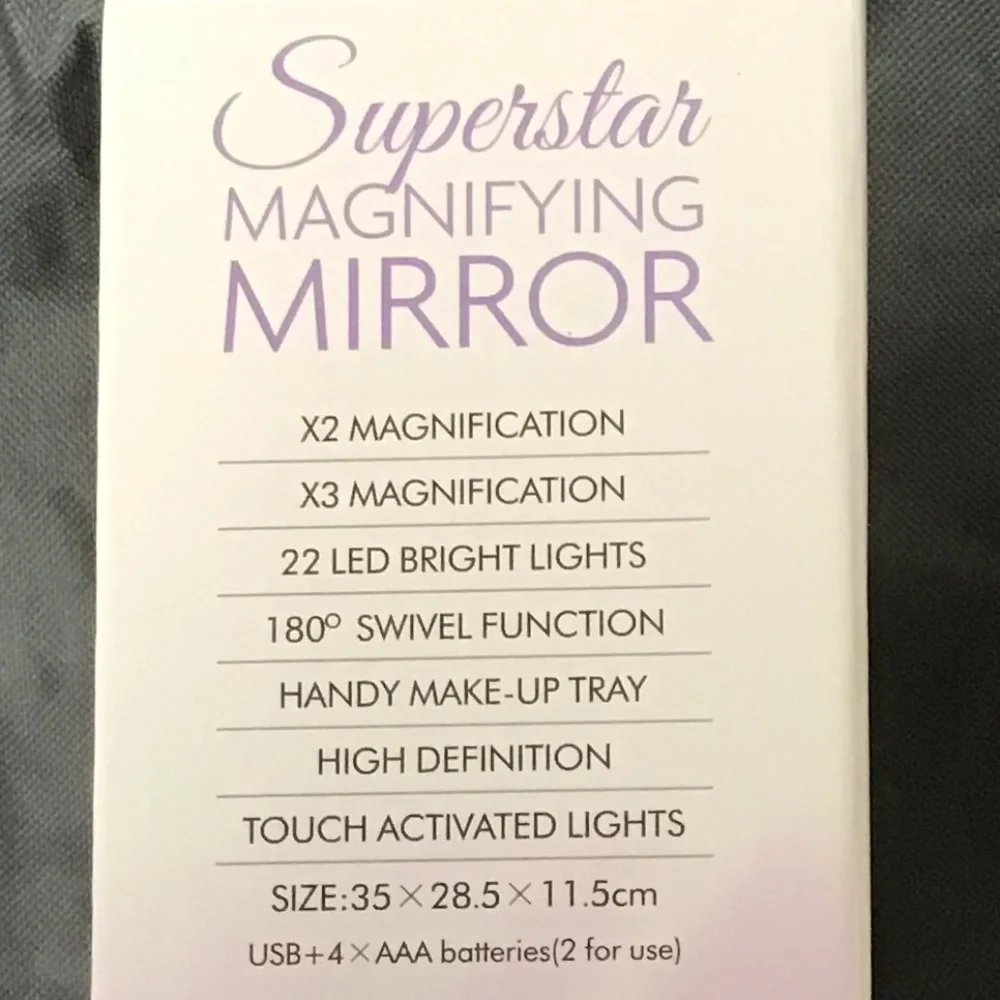 NWOT MAGNIFYING MIRROR WITH TOUCH SENSITIVE